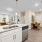 Open Kitchen counter height bar with view of living room and desk