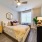 bedroom area with open space and natural lighting from a large window